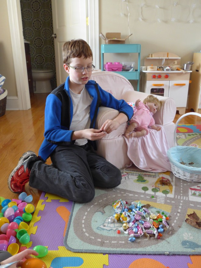 Grey, reclining with eggs and loot